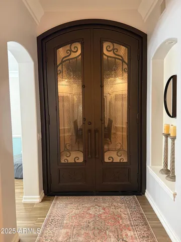 a dining room with furniture and window