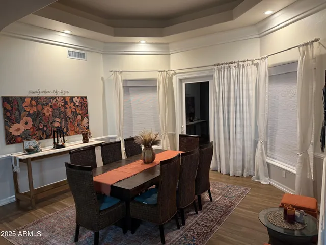 a workspace with furniture and wooden floor