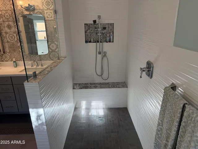 a bathroom with a bathtub and sink