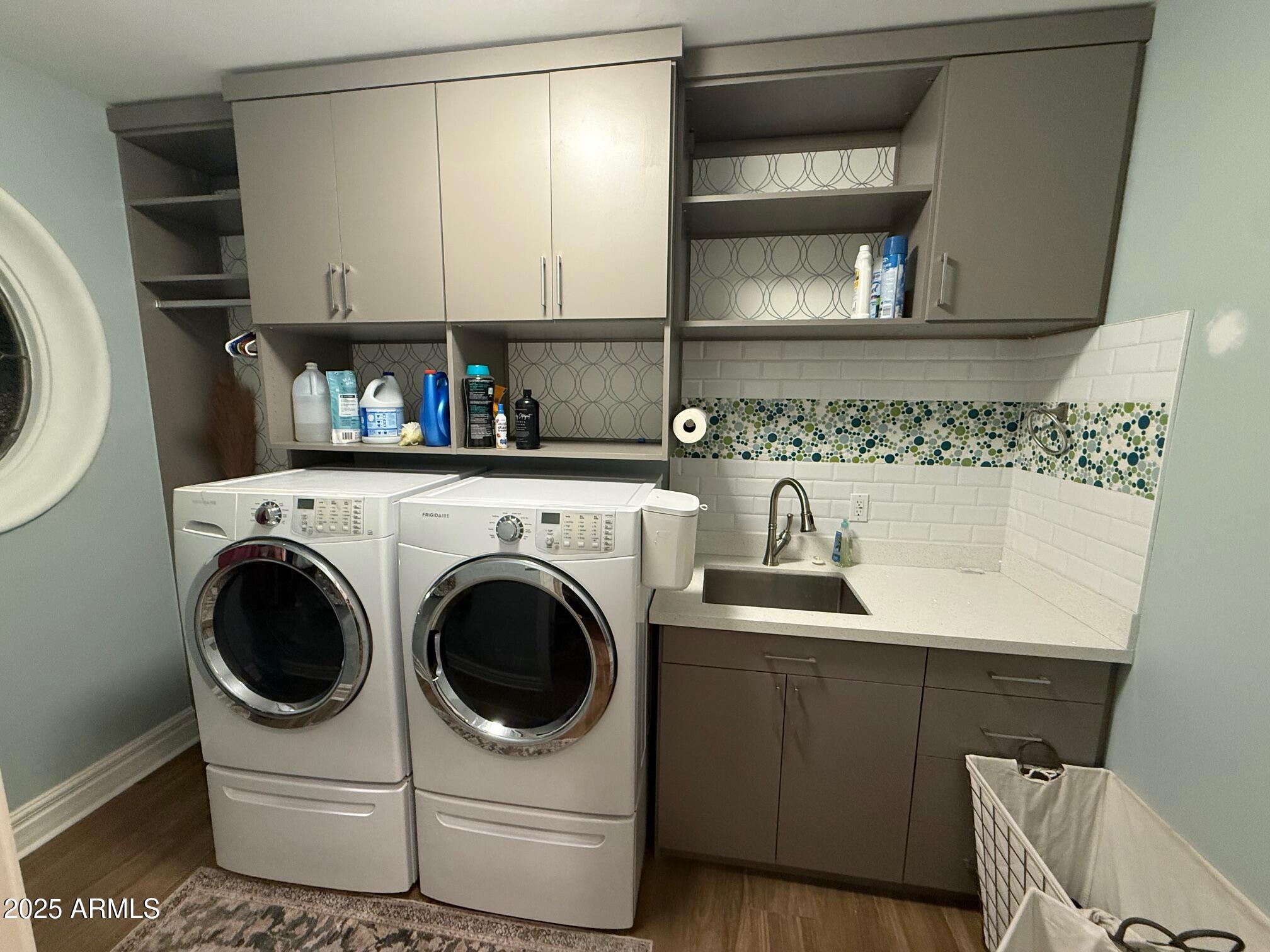 4055 North Recker Road, Unit 62 Mesa, AZ 85215 - Photo 46 of 47 a utility room with sink dryer and washer