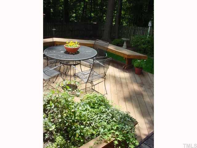 3113 Hiking Trail Raleigh, NC 27615 - Photo 11 of 12 Sellers have doubled the deck size and added built-in seating. There is also a bult -in planter... you'll be impressed!