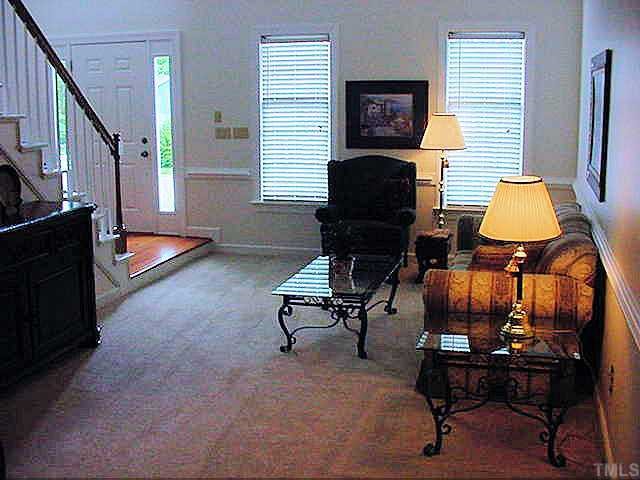 3113 Hiking Trail Raleigh, NC 27615 - Photo 3 of 12 Living Room and Dining Room are open and great areas for entertaining!