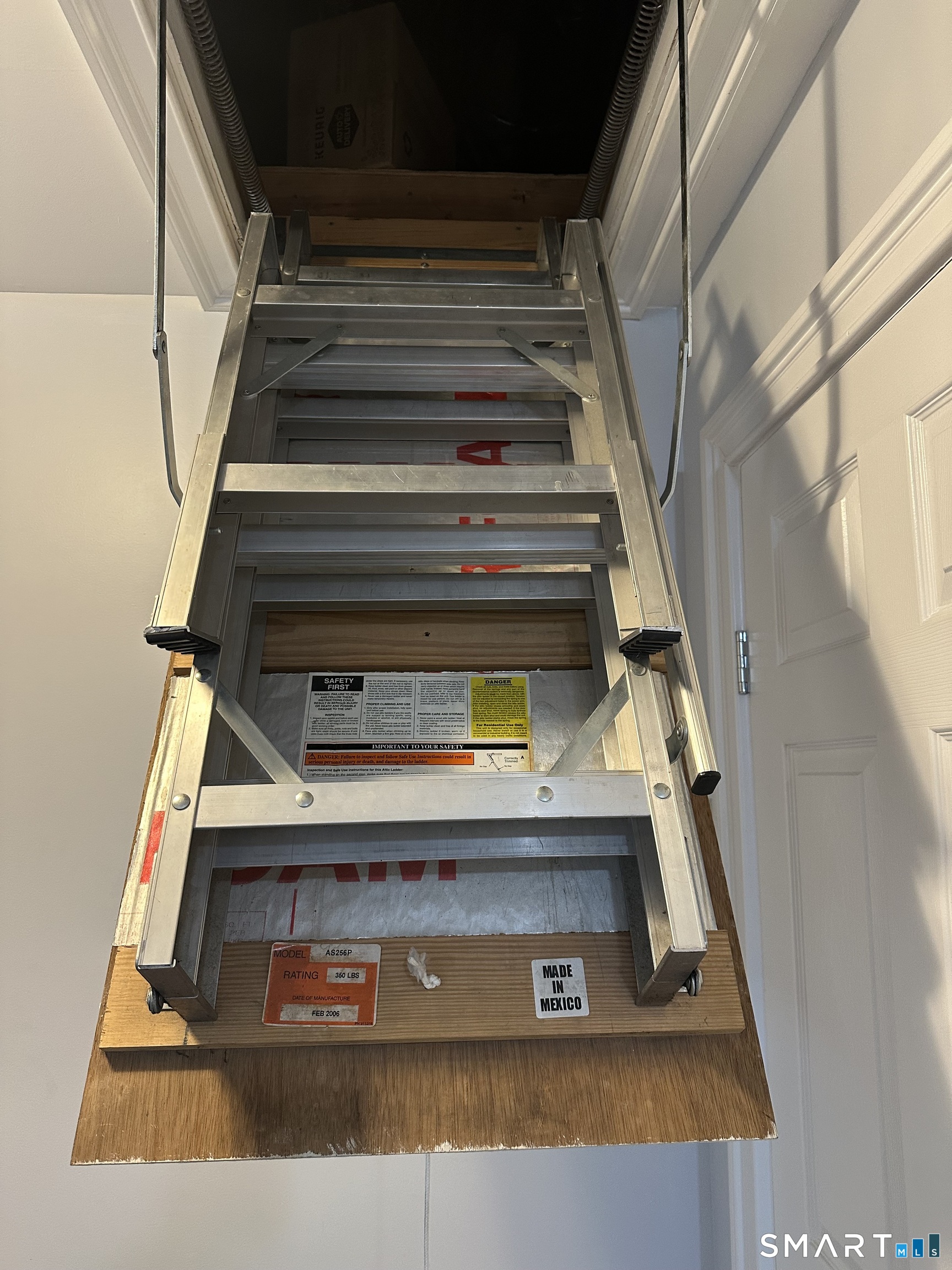 21 Friendly Road Norwalk, CT 06851 - Photo 25 of 28 New aluminum attic stairs give easy access to a full attic with plenty of storage.