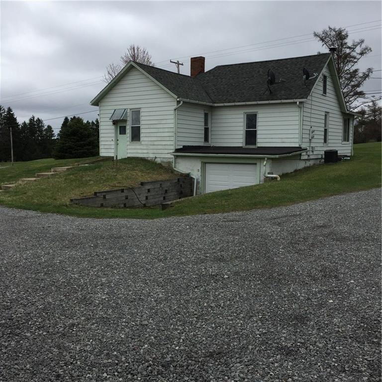 289 Golf Course Road Volant, PA 16156 - Photo 19 of 24 Rear of house with integral two car garage.