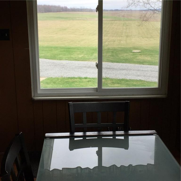 289 Golf Course Road Volant, PA 16156 - Photo 3 of 24 Eat-in Kitchen looking out towards back yard and acreage.