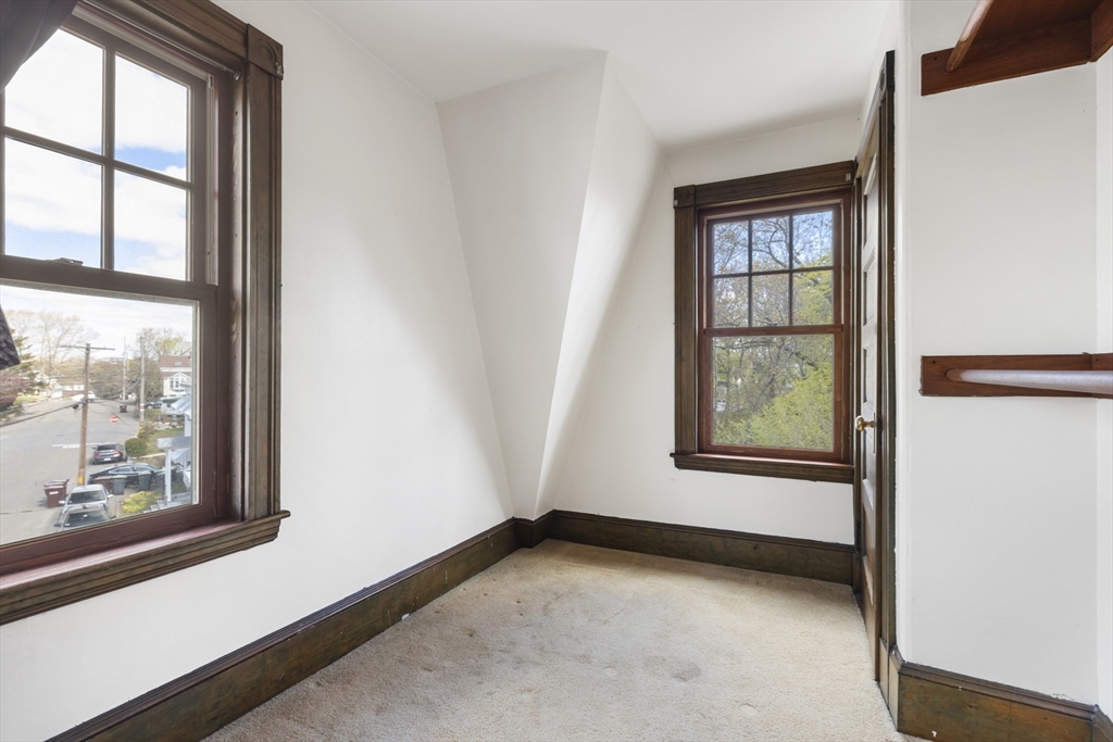 54 Oak Street Dedham, MA 02026 - Photo 25 of 36 an empty room with windows