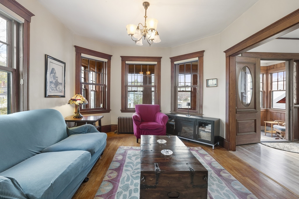 54 Oak Street Dedham, MA 02026 - Photo 8 of 36 a living room with furniture and wooden floor
