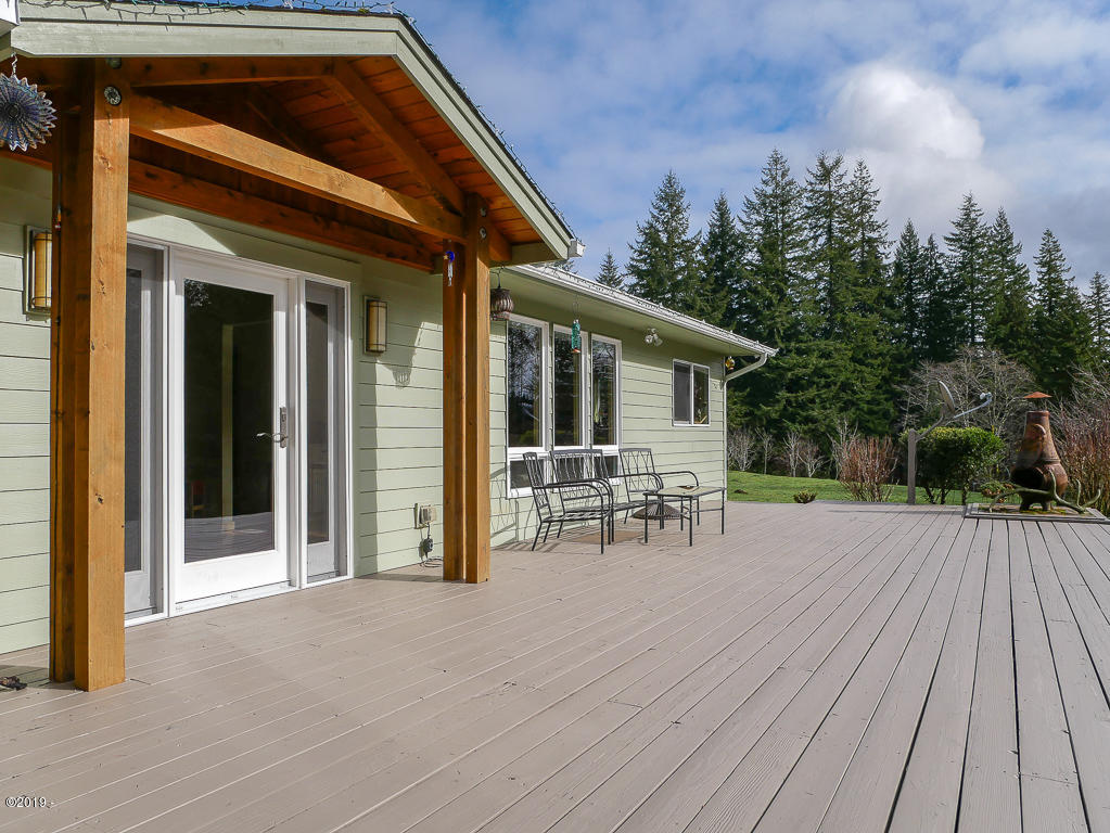 4109 Logsden Road Siletz, OR 97380 - Photo 3 of 40 Front deck