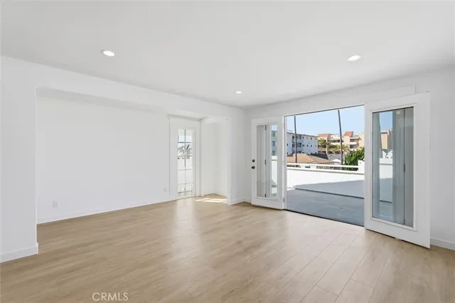 a view of a kitchen with a dishwasher and a refrigerator