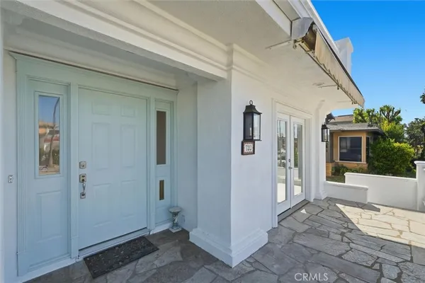a view of a house with a flat screen tv