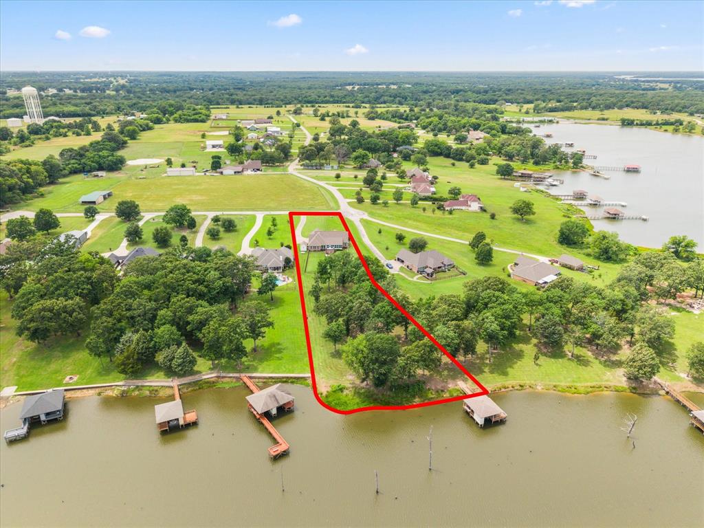 345 Rains County Road 3390 Emory, TX 75440 - Photo 37 of 39 swimming pool view with a lake view