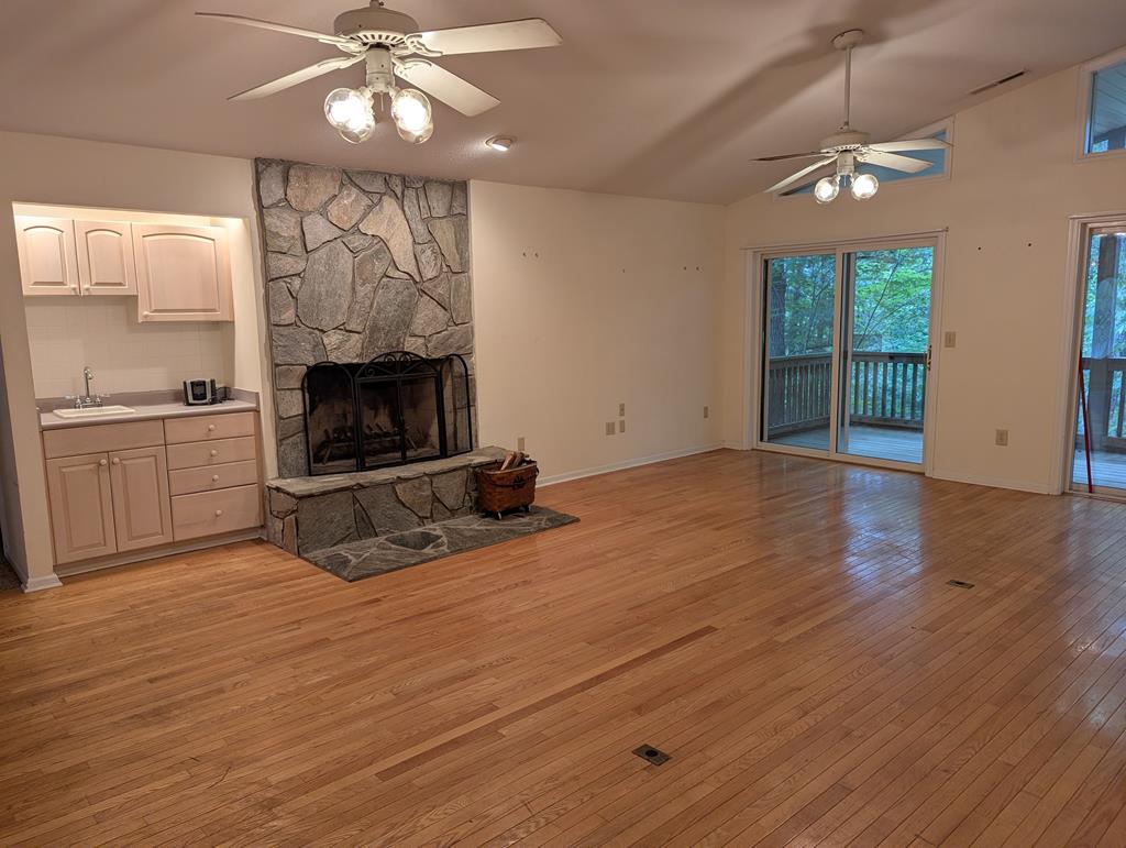 283 Deaver Cove Road Blairsville, GA 30512 - Photo 18 of 27 Lower Level TV room/Library/Den, Beautiful built-ins on terrace lever with screened porch.