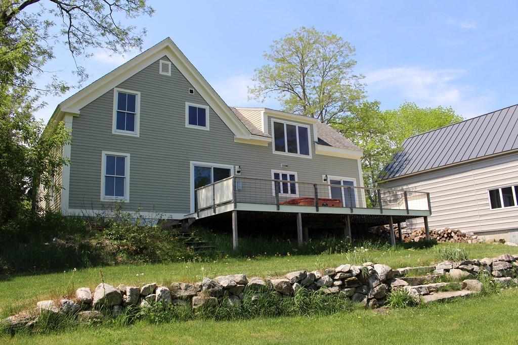 320 Penney Road New Gloucester, ME 04260 - Photo 2 of 33 Back of house with large deck
