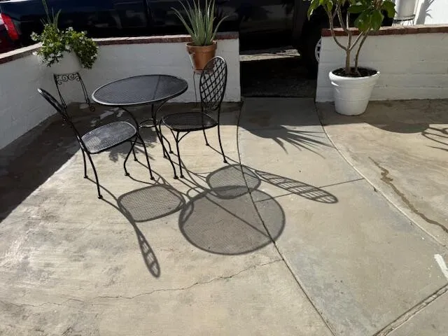 a dining room with table and chairs