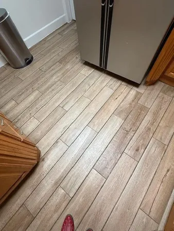 a view of wooden floor with entryway
