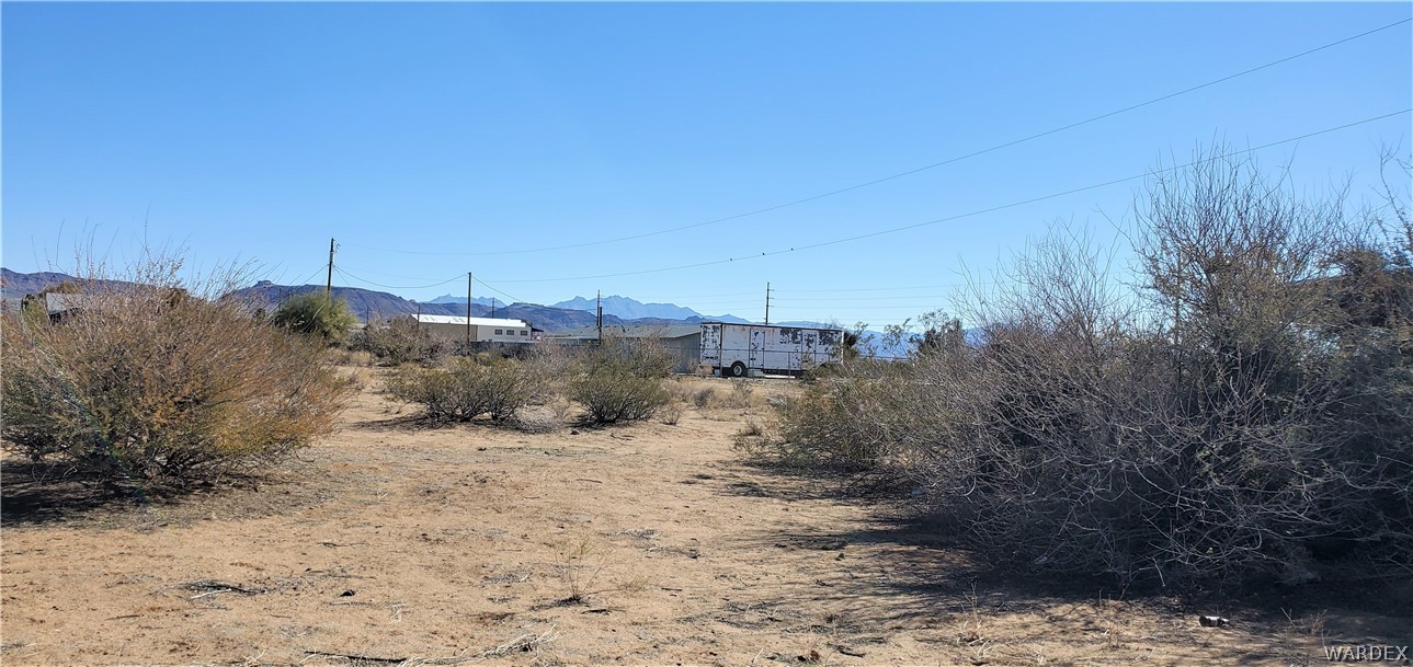 0 North Verde Road Golden Valley, AZ 86413 - Photo 9 of 16 a view of a dry yard with trees