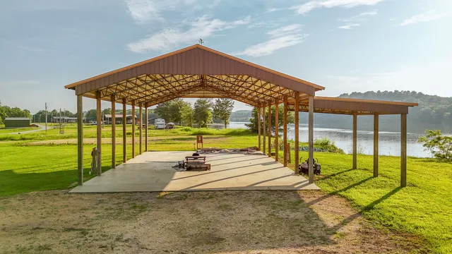 a view of a swimming pool with an outdoor seating