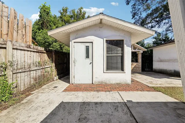 a white house with a outdoor space