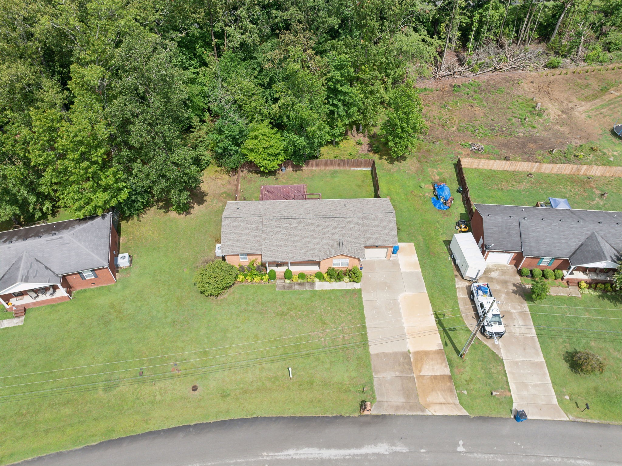 373 Oak Hollow Road Manchester, TN 37355 - Photo 27 of 34 an aerial view of a house with a yard basket ball court and outdoor seating