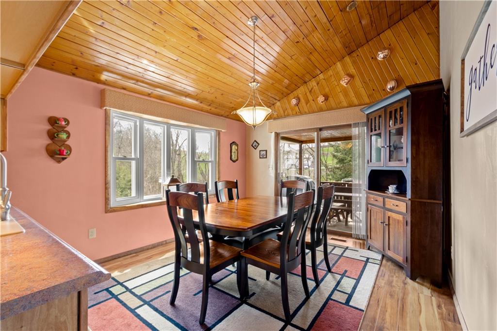 105 Deer Run Road Washington, PA 15301 - Photo 13 of 25 Gorgeous wood plank ceilings, hardwood floors and access to the beautiful covered porch for indoor/outdoor living.