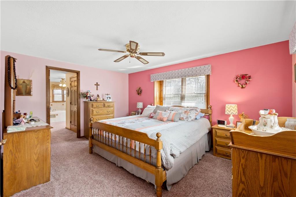 105 Deer Run Road Washington, PA 15301 - Photo 15 of 25 The large owners suite has two closets with walk in access and large windows for a light and bright feeling.