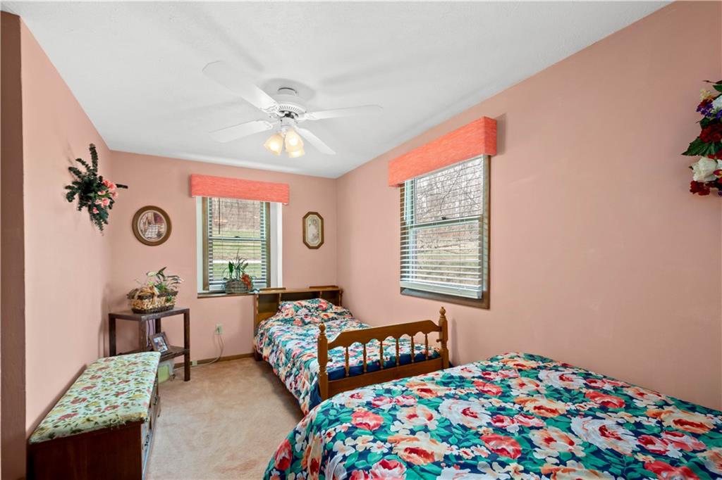 105 Deer Run Road Washington, PA 15301 - Photo 17 of 25 Bedroom 2 is spacious and has multiple windows to take in the country view!