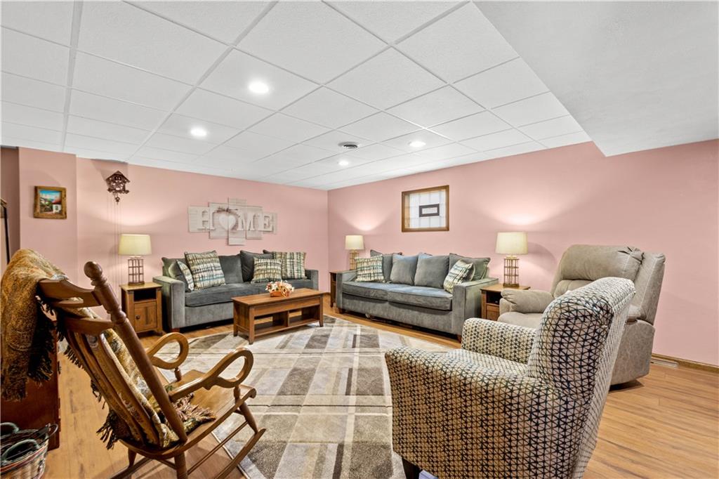 105 Deer Run Road Washington, PA 15301 - Photo 22 of 25 Spacious and clean with upgraded hardwood flooring, this game room is sure to please!