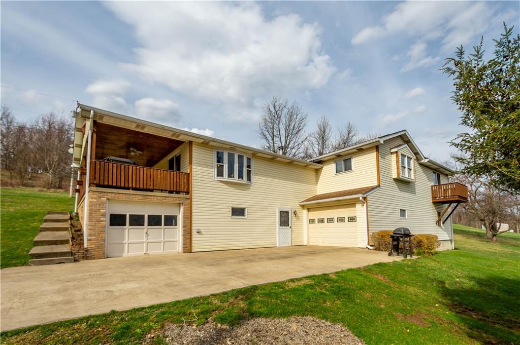 105 Deer Run Road Washington, PA 15301 - Photo 6 of 25 Plenty of extra parking on the large driveway parking pad.
