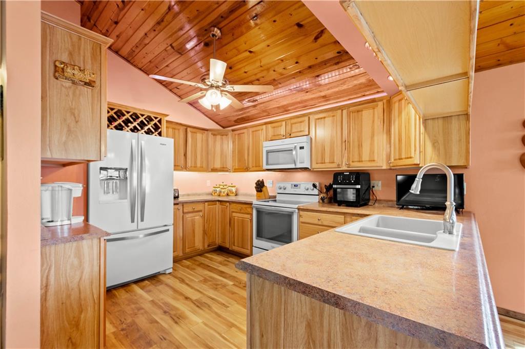 105 Deer Run Road Washington, PA 15301 - Photo 8 of 25 Upgraded cabinetry and hardwood floors throughout the kitchen!