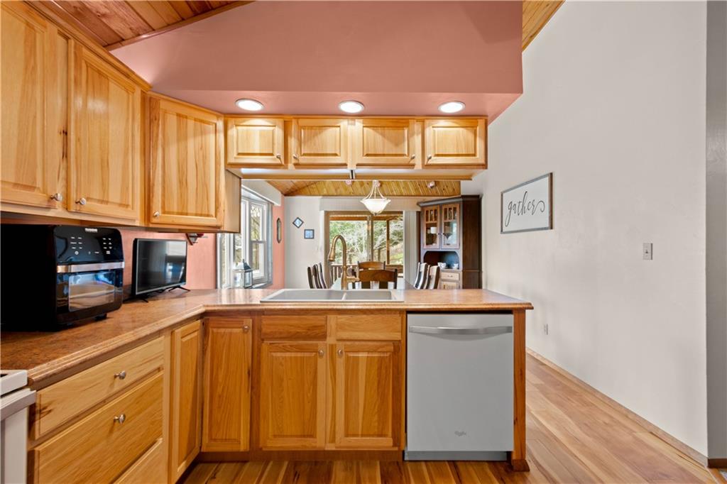 105 Deer Run Road Washington, PA 15301 - Photo 10 of 25 The kitchen is open the the dining room with large windows and lots of natural light!