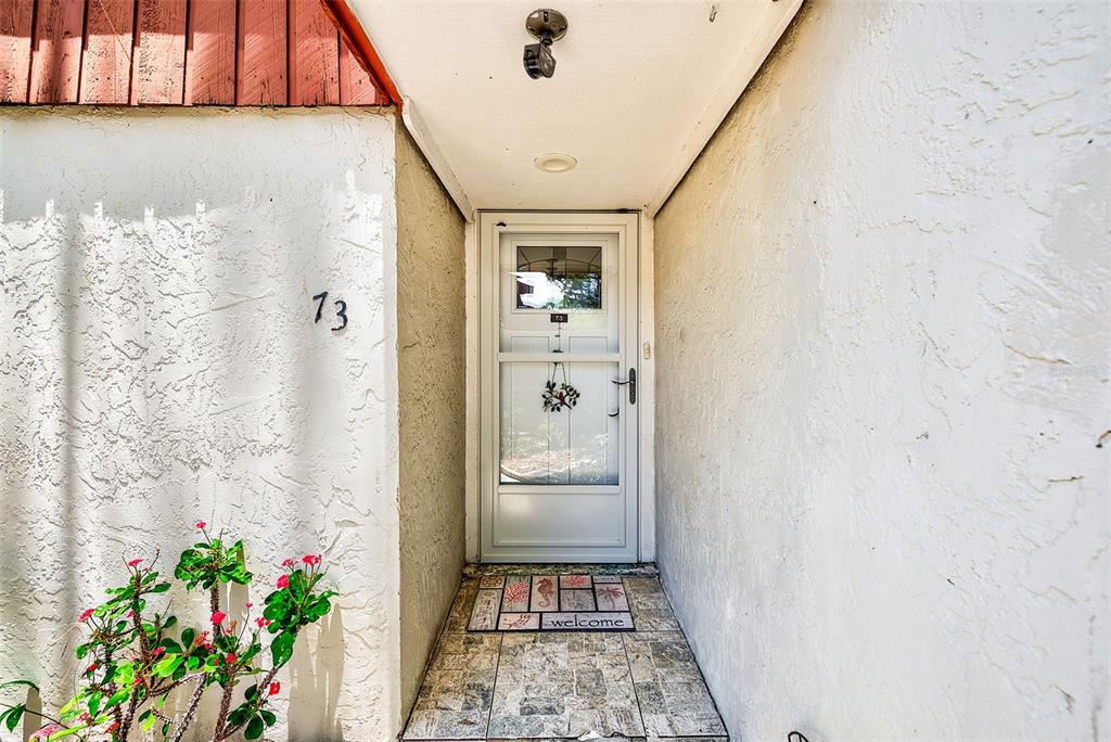 2064 Sunset Point Road, Unit 73 Clearwater, FL 33765 - Photo 6 of 58 a bathroom with a shower