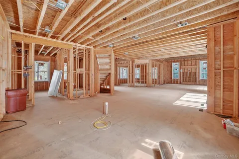 a view of an empty room with windows