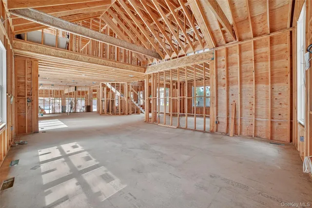 a view of an empty room with entrance gate