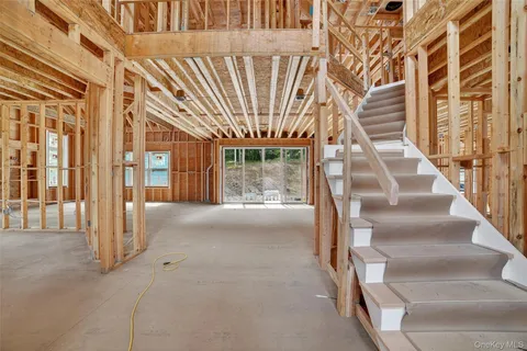 a view of an empty room with a balcony