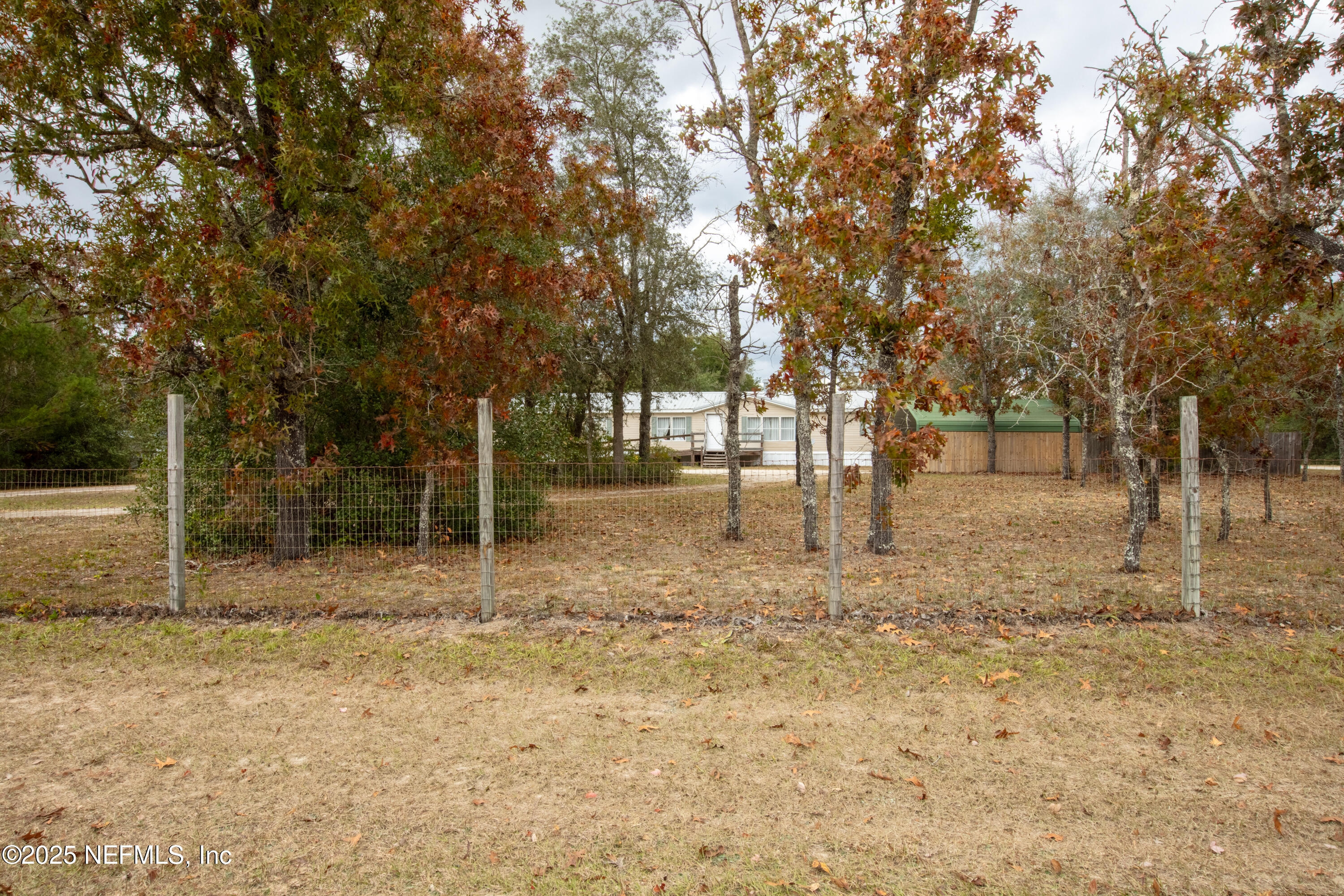 5750 Sequoia Road Keystone Heights, FL 32656 - Photo 2 of 33 a view of outdoor space with trees