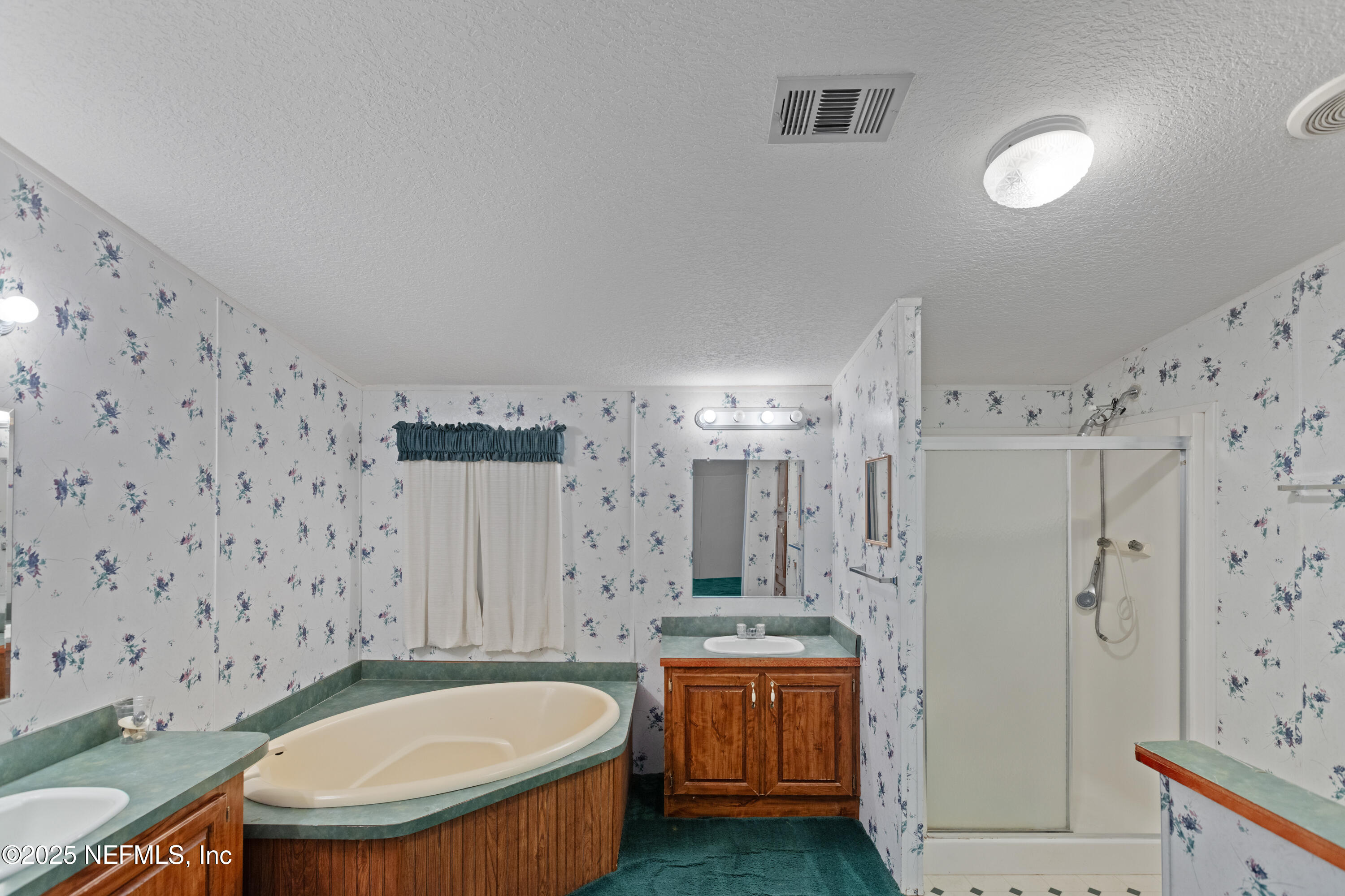 5750 Sequoia Road Keystone Heights, FL 32656 - Photo 21 of 33 a bathroom with a sink a toilet and shower