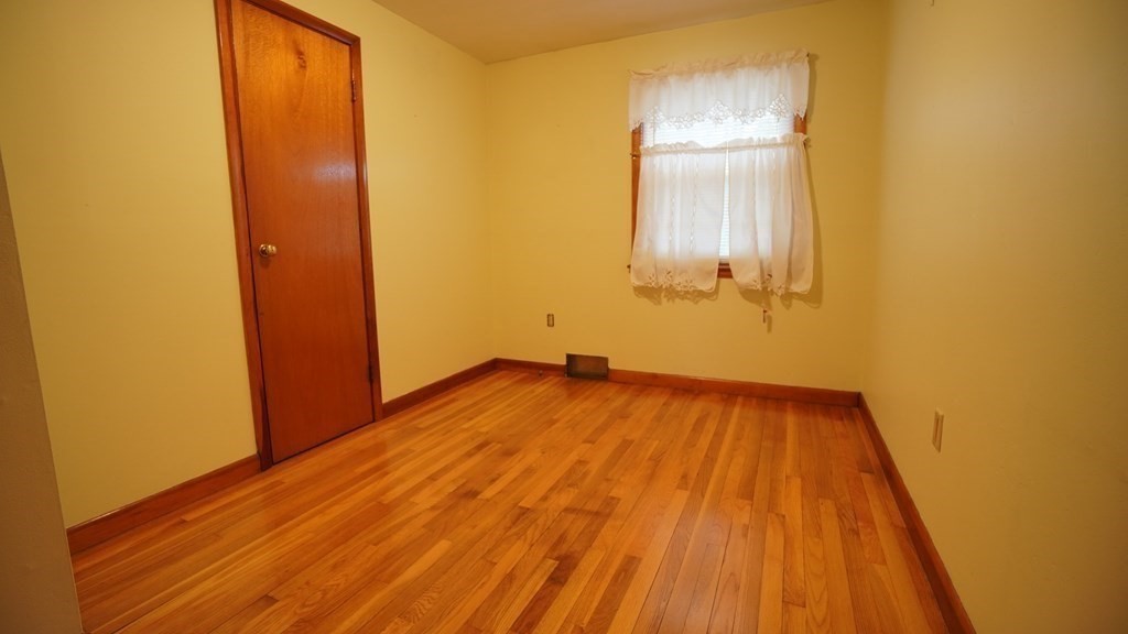 32 North Brook Road Springfield, MA 01119 - Photo 11 of 17 a view of empty room with wooden floor
