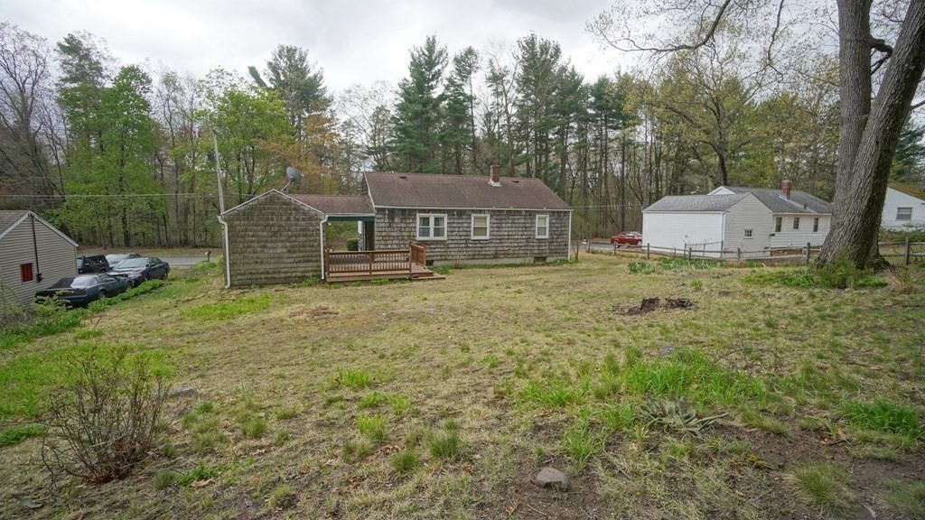 32 North Brook Road Springfield, MA 01119 - Photo 17 of 17 a front view of a house with a yard and trees