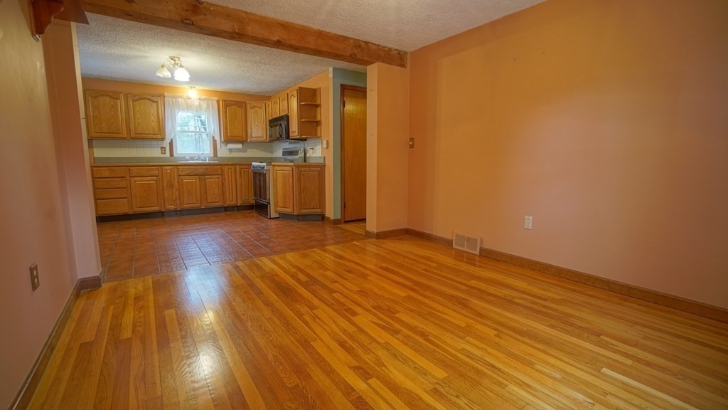 32 North Brook Road Springfield, MA 01119 - Photo 7 of 17 a view of a kitchen with wooden floor
