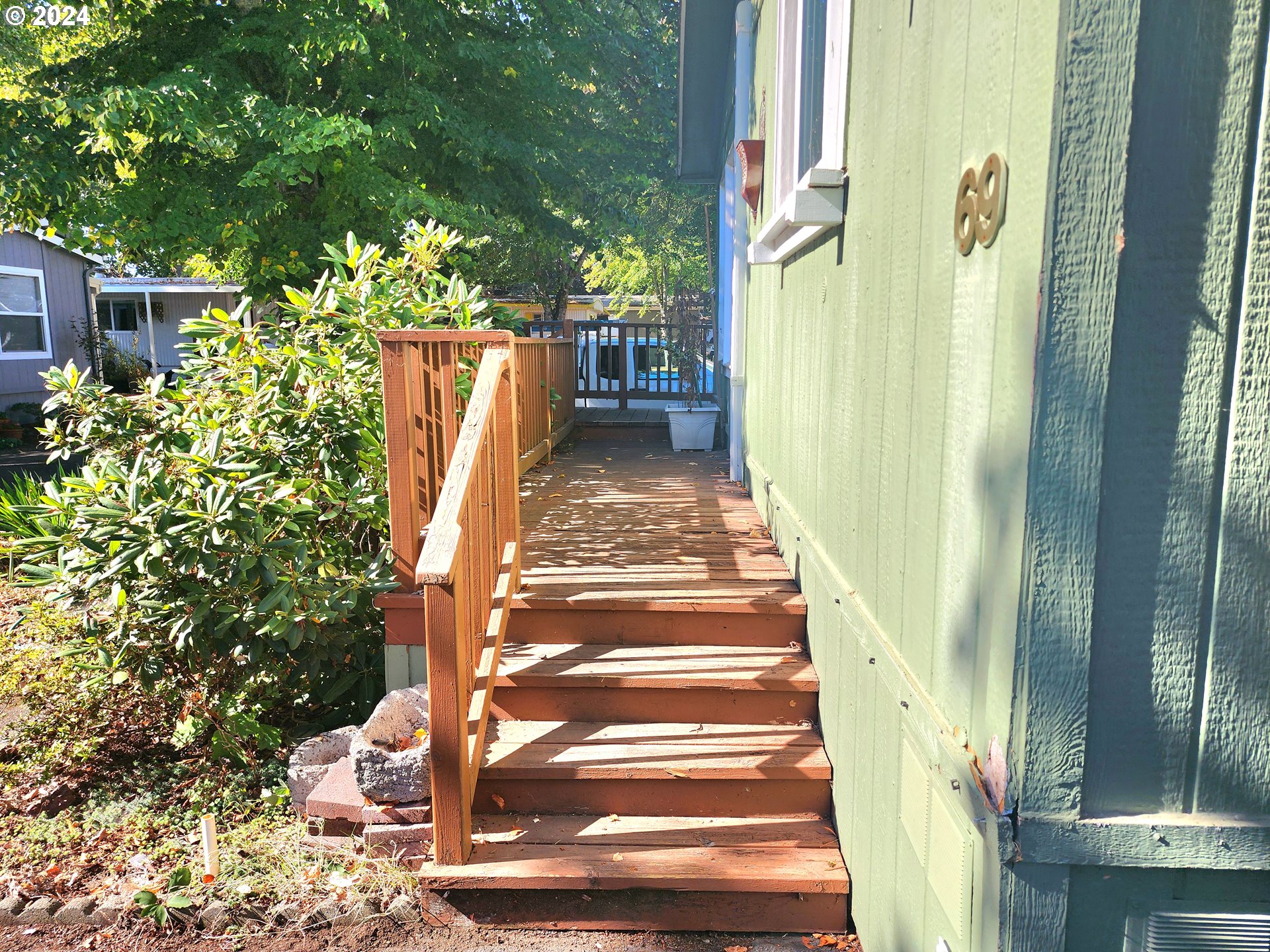 1475 Green Acres Road, Unit 69 Eugene, OR 97408 - Photo 3 of 15 a view of a pathway of a building