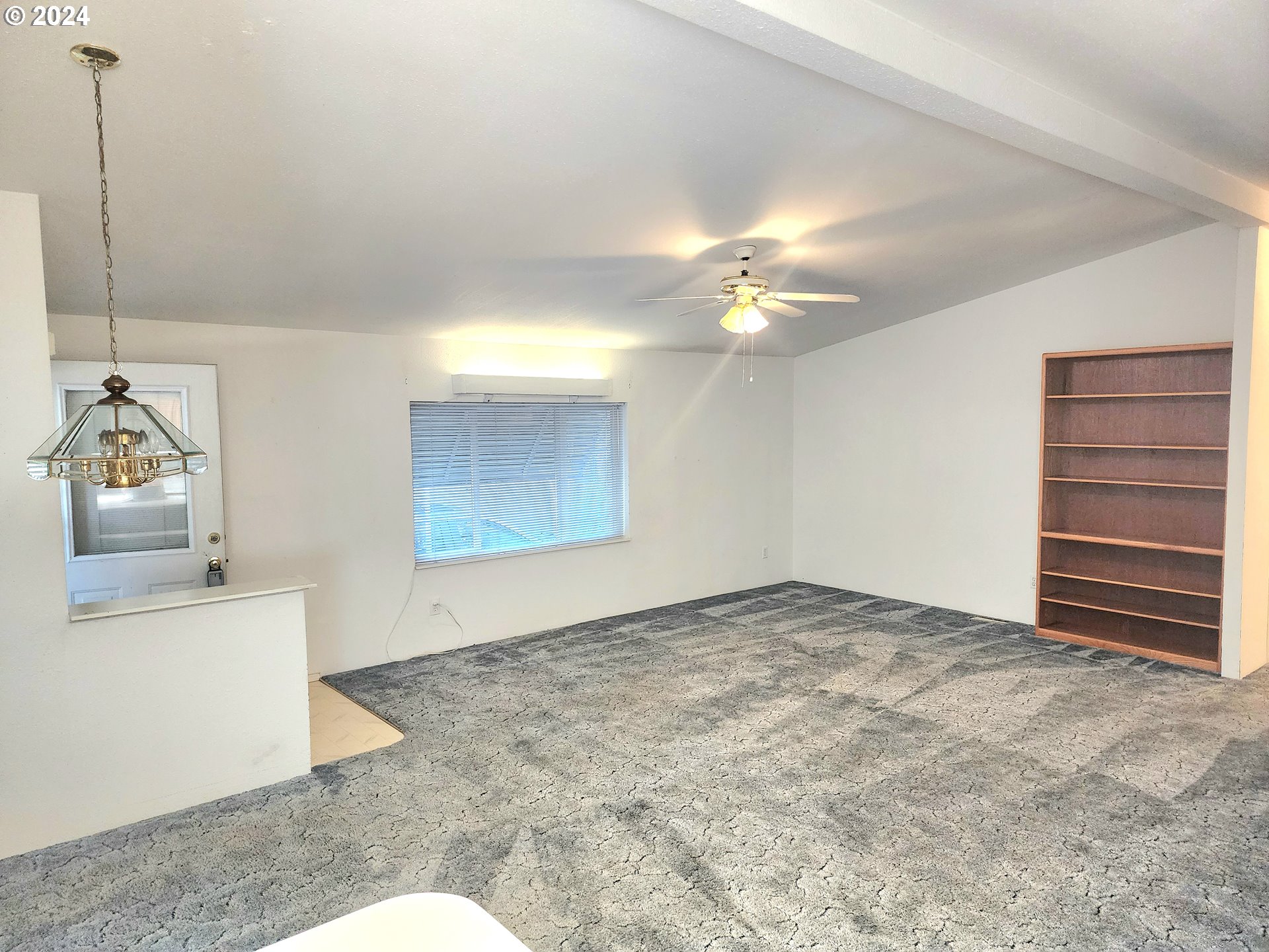 1475 Green Acres Road, Unit 69 Eugene, OR 97408 - Photo 9 of 15 a view of an empty room with a cabinet