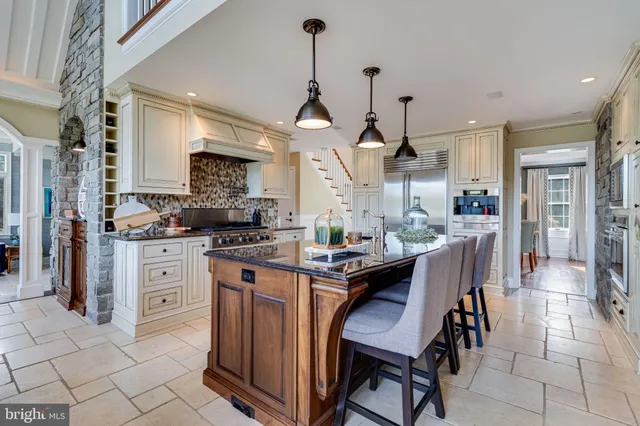 a living room with furniture fireplace and flat screen tv