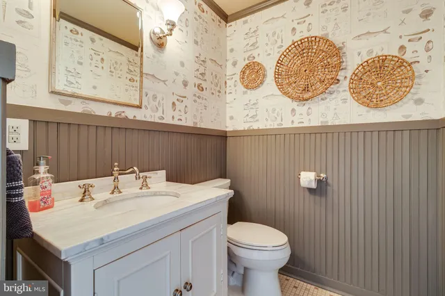 a bedroom with a bed and a fireplace