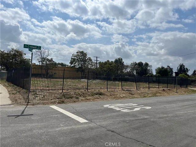 a view of a street with cars