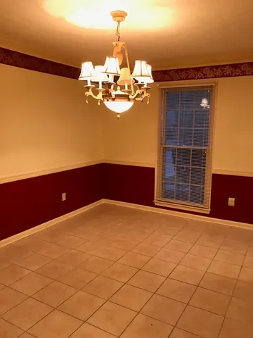 a view of a room with windows