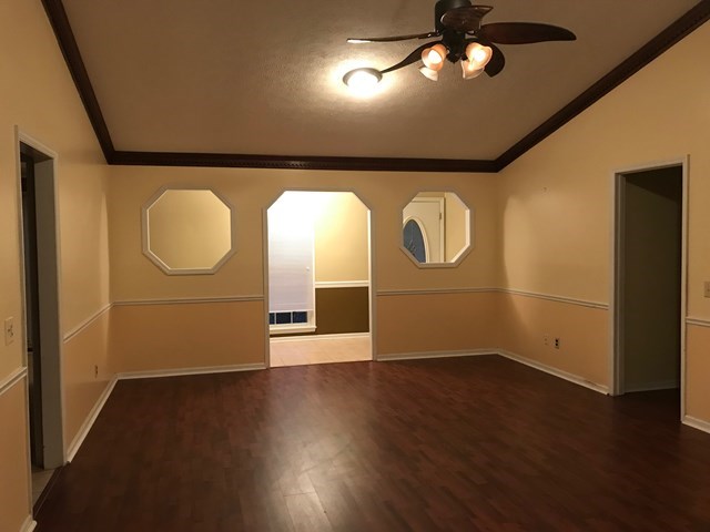 4109 Pickering Drive Columbus, GA 31907 - Photo 6 of 11 an empty room with wooden floor and windows