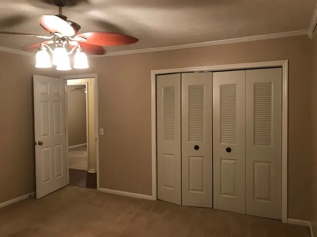 wooden floor in an empty room with a mirror