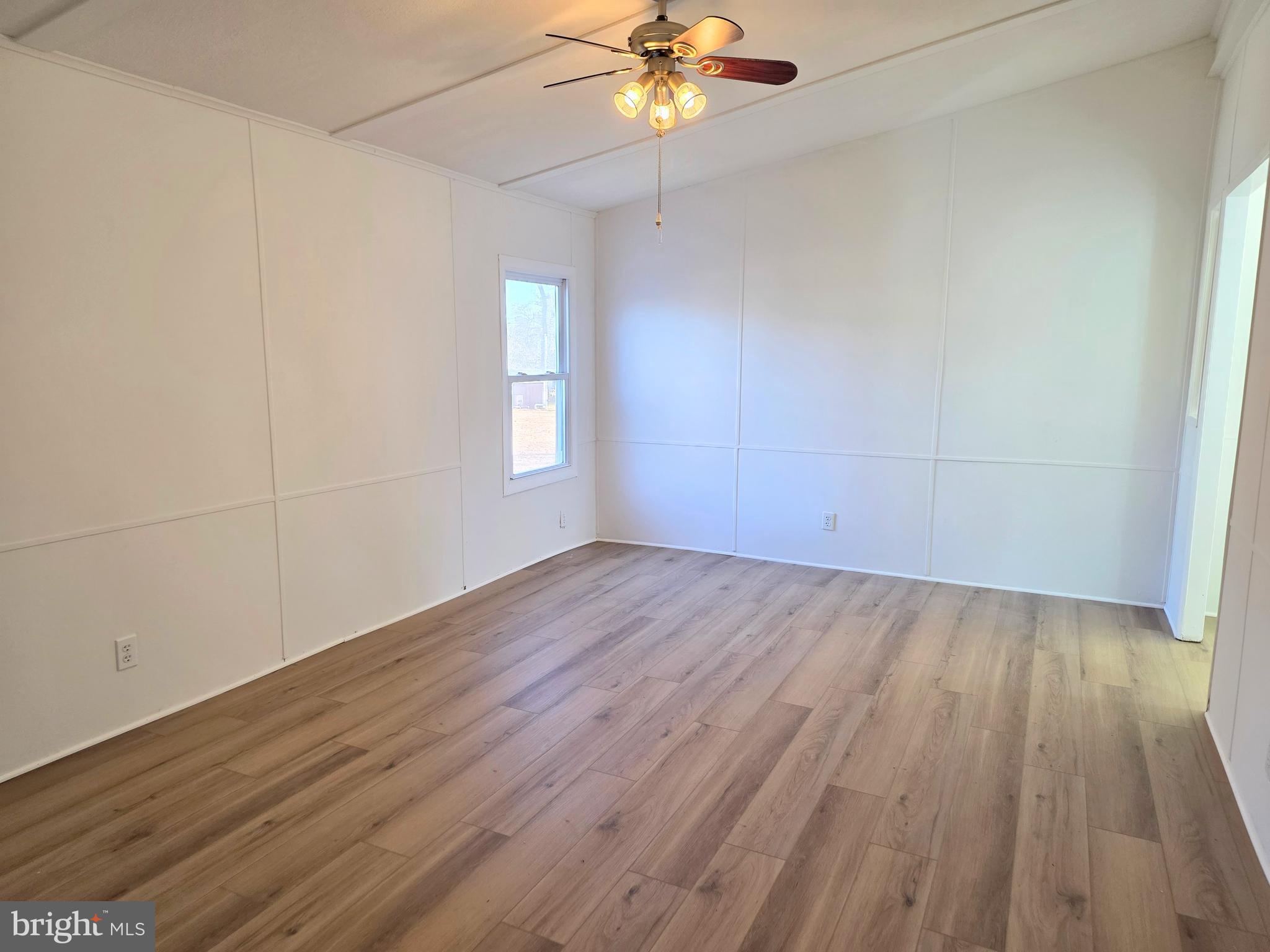 7 Barbara Lane Barnegat, NJ 08005 - Photo 13 of 25 wooden floor in an empty room with a window