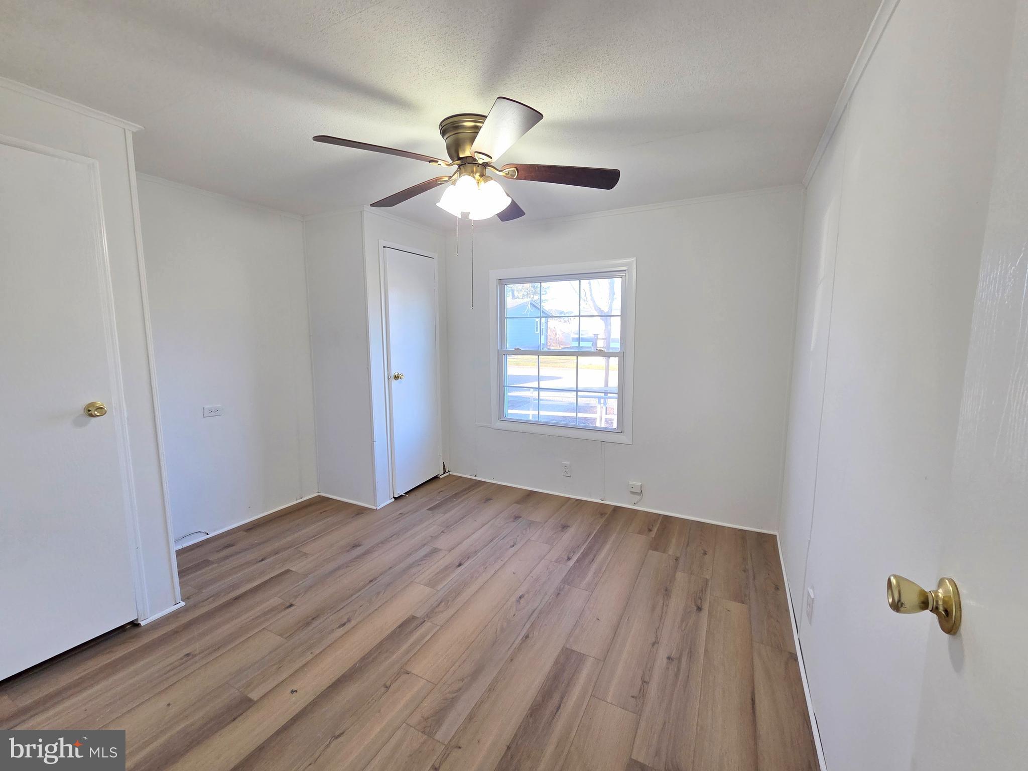 7 Barbara Lane Barnegat, NJ 08005 - Photo 19 of 25 wooden floor in an empty room with a window