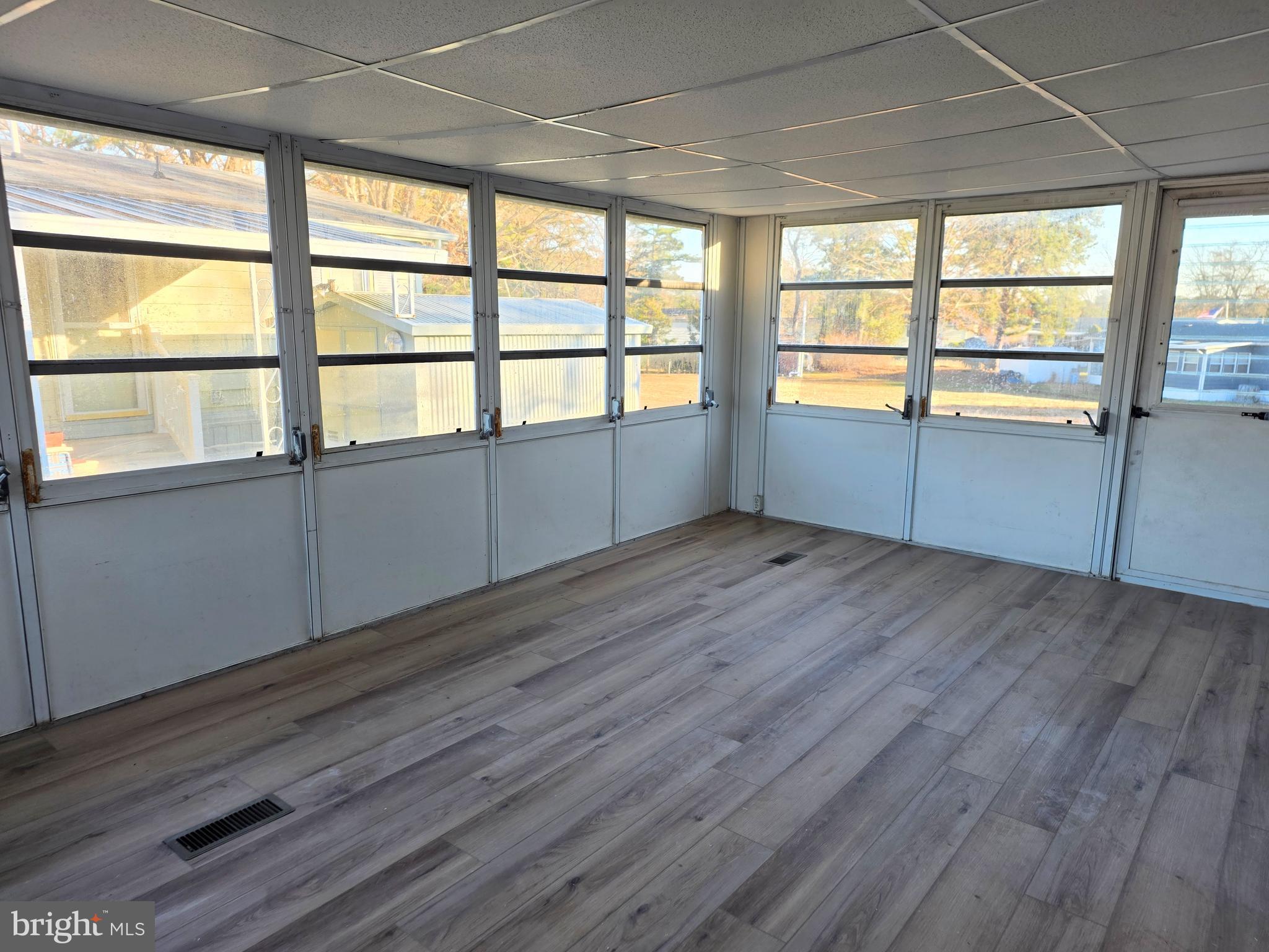 7 Barbara Lane Barnegat, NJ 08005 - Photo 21 of 25 wooden floor in an empty room with a window